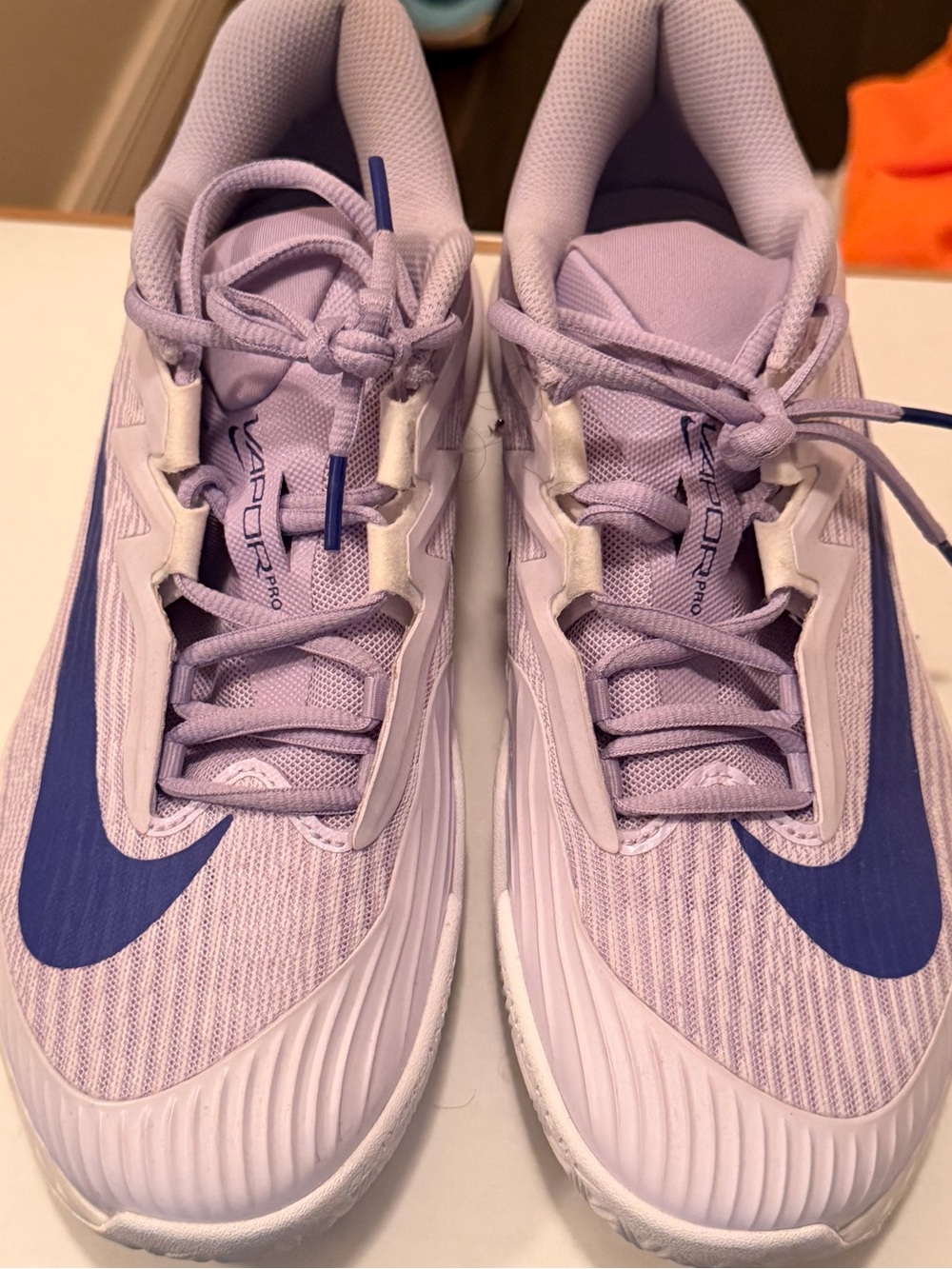 Nike Women's Light Lavender Running Shoes with Blue Swoosh